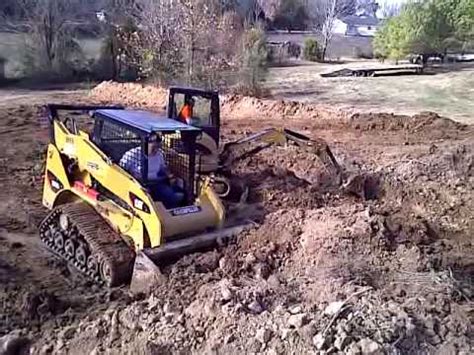 skid steer pond|skid steer for digging a pond.